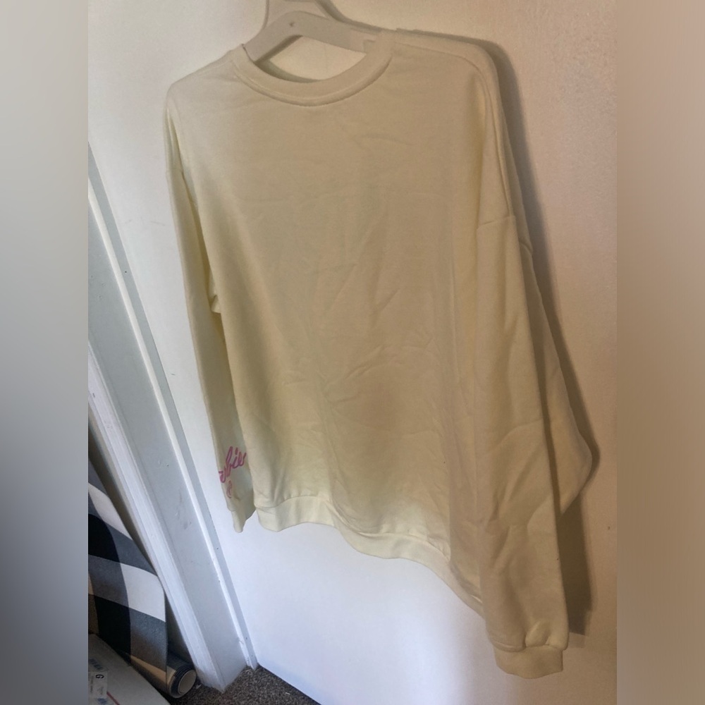 White Barbie sweatshirt in size XL. Has picture of Barbie on a flamingo.1 left - Picture 3 of 4